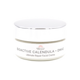 Front of calendula facial cream jar. Metal lid with white label.