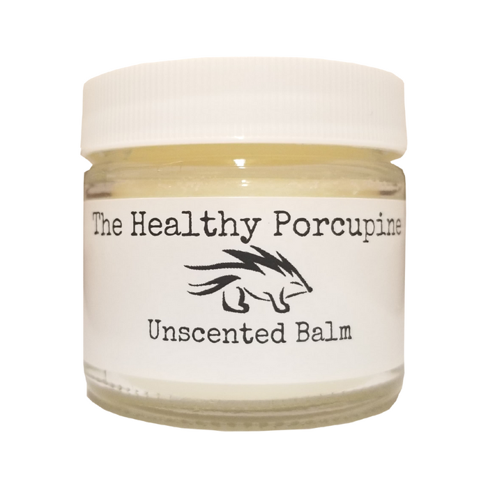 Glass jar of grass fed tallow balm with white lid and white label.