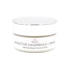Front of calendula facial cream jar. Metal lid with white label.